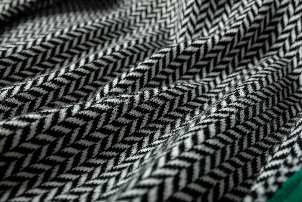 JANELLE – HERRINGBONE HIGH-NECK SWEATER