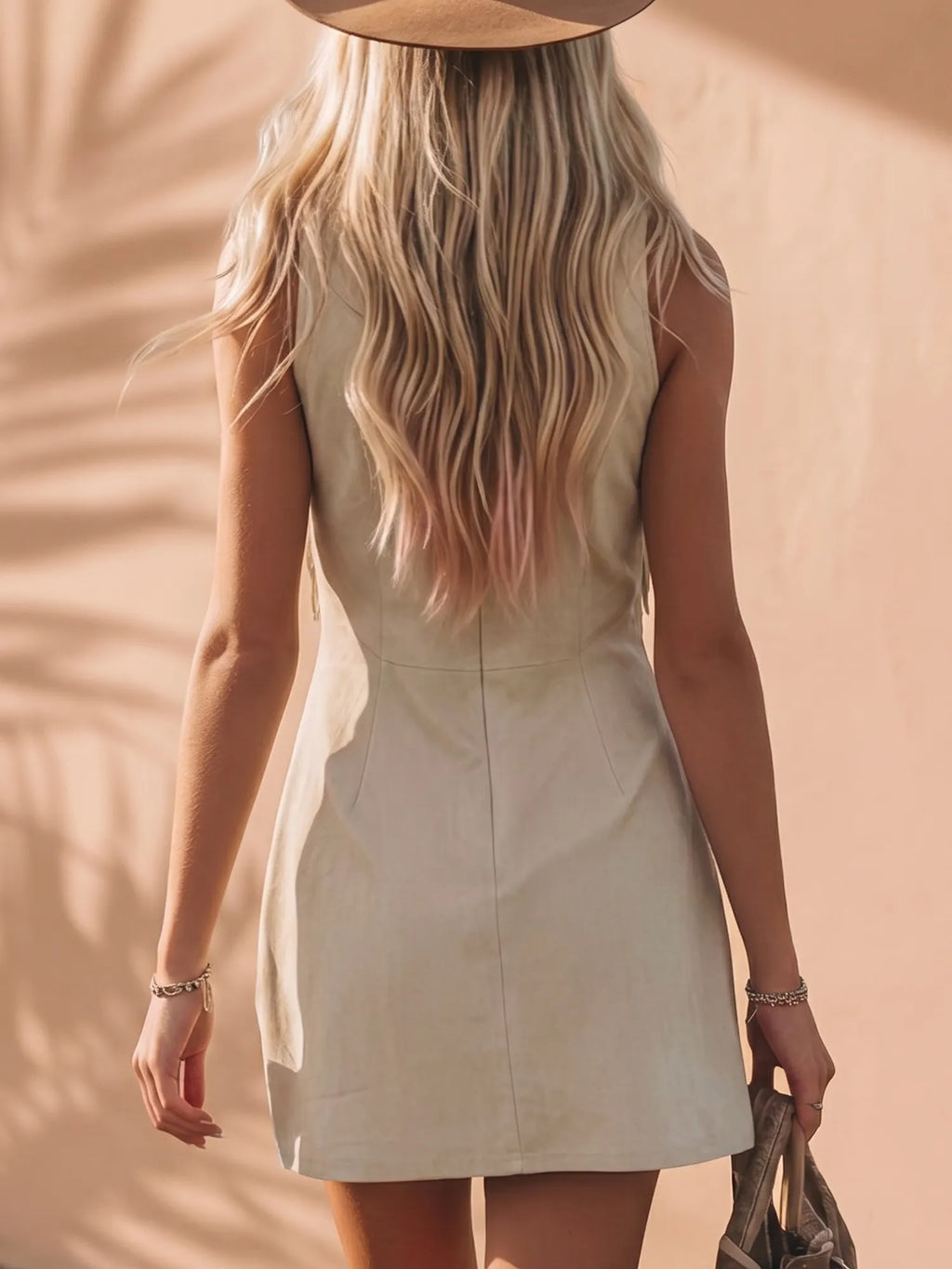 Western-Style Mini Dress — Beach Beige With Heavy-Duty Sky Blue Floral Embroidery, Tasseled Front, And Asymmetrical Cut.
