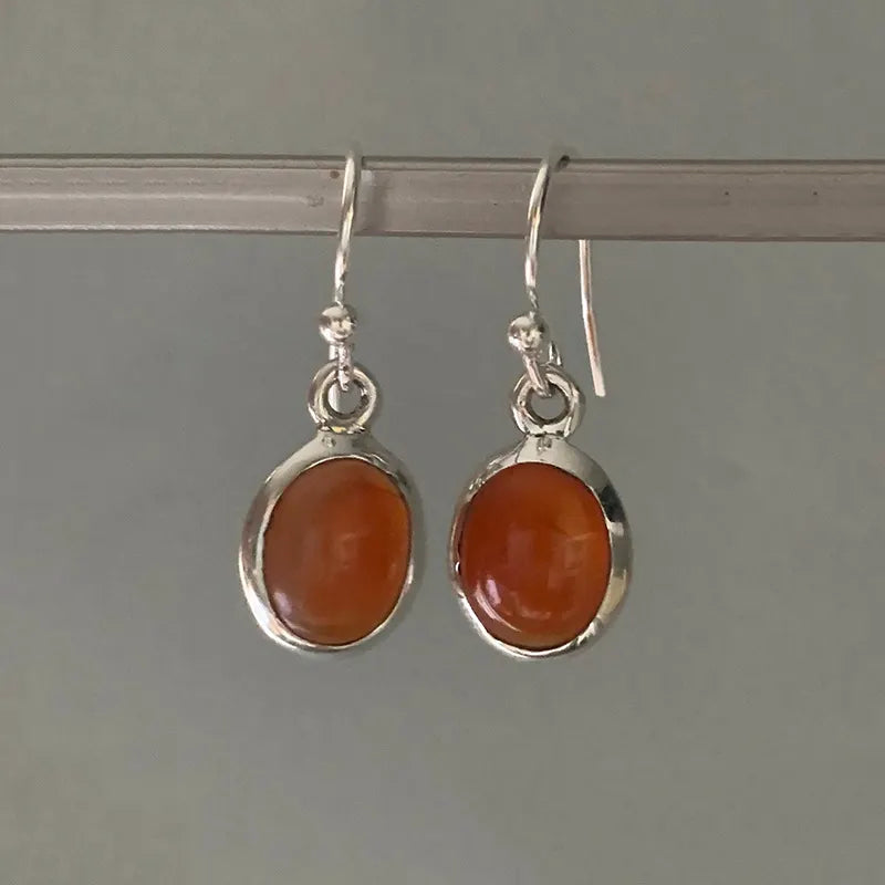 Coral oval hanging earrings