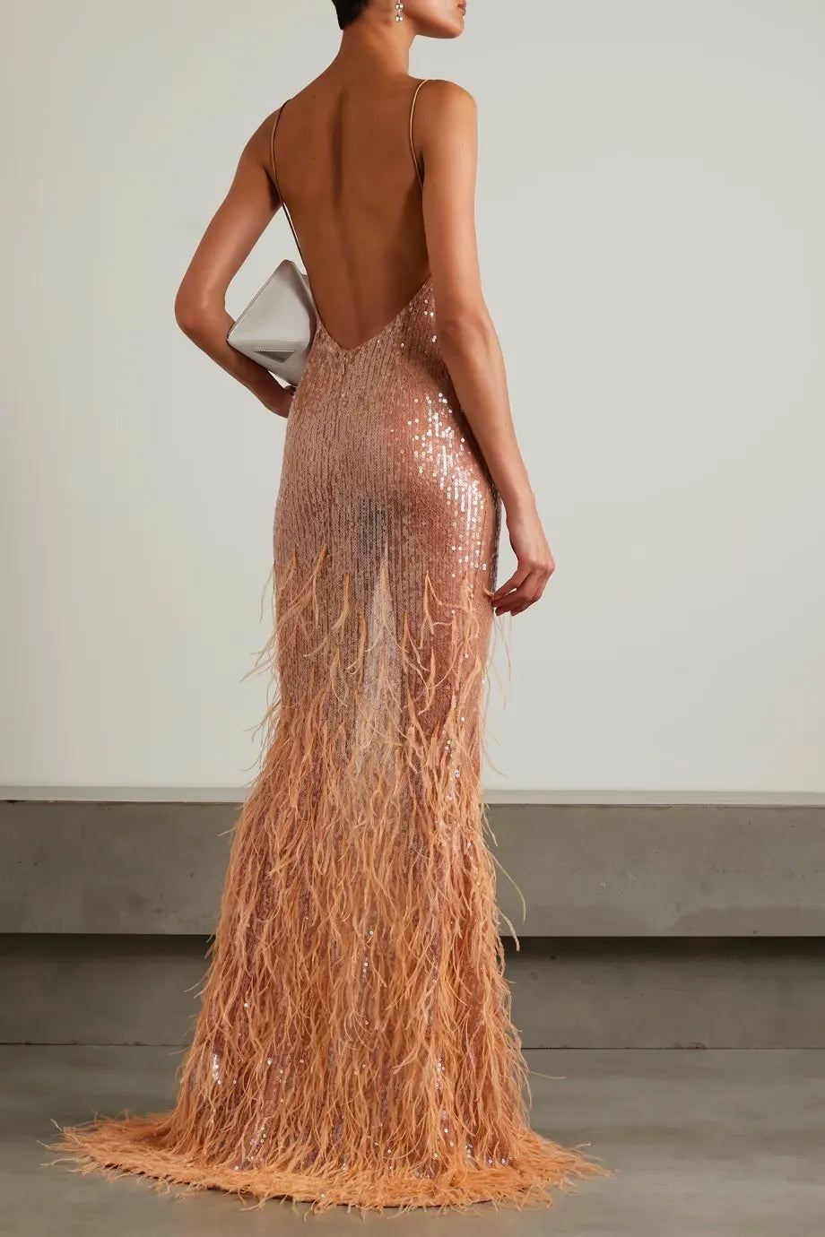 Feather-trimmed sequined lace gown